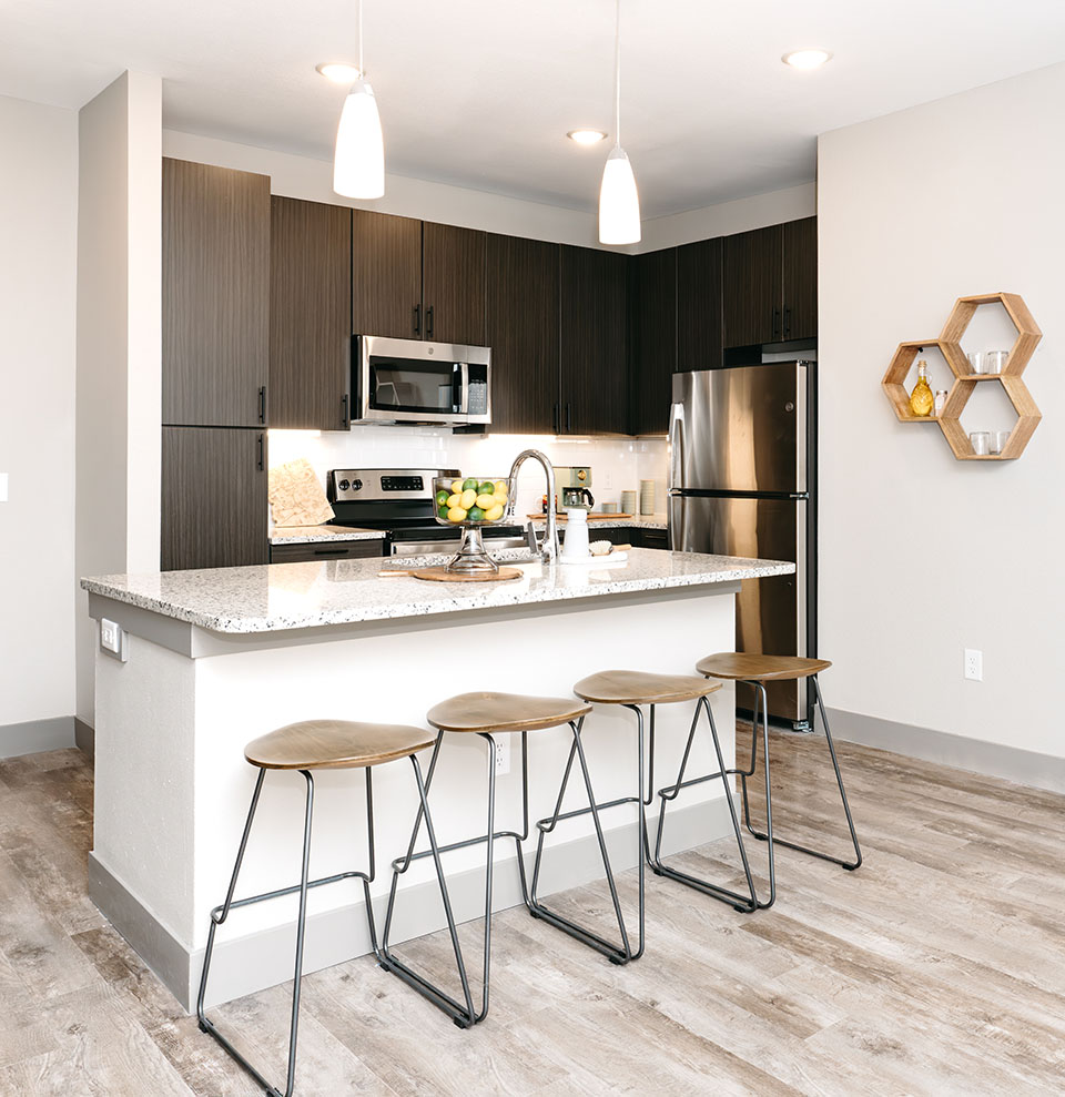 A kitchen with stainless-steel appliances