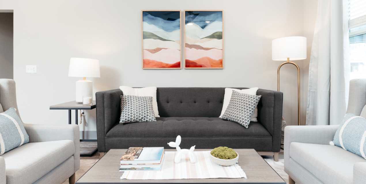 A dark gray couch in a living room